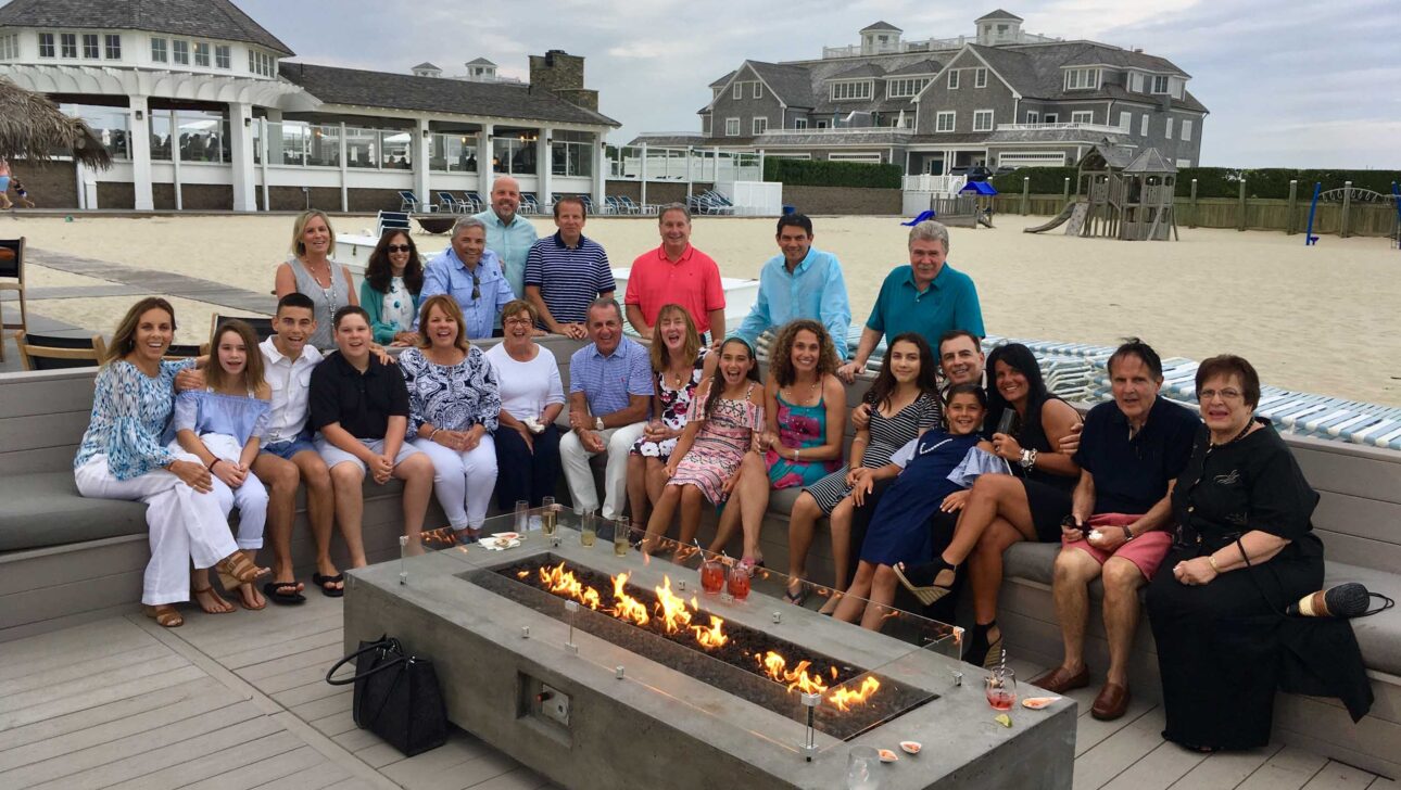 A family celebrating a birthday together.